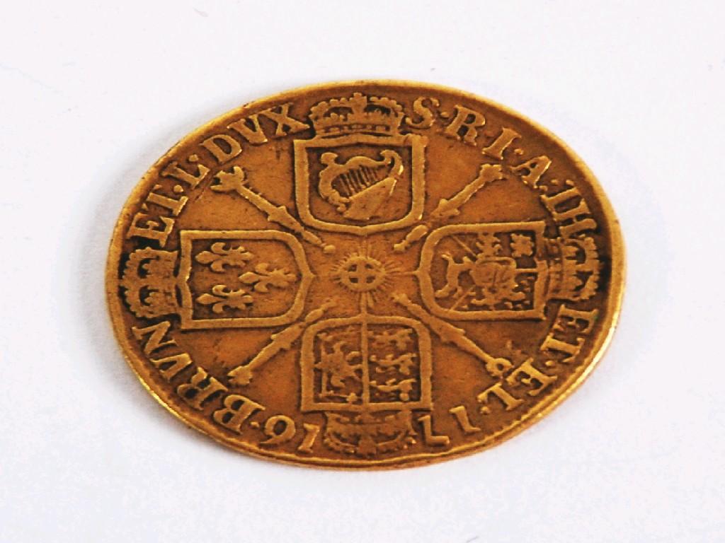 Appraisal: GEORGE I GOLD GUINEA fourth head worn and bent EST