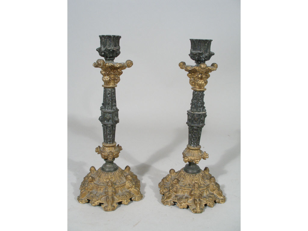 Appraisal: Pair of Cast Metal Candlesticks Baroque Style five part form