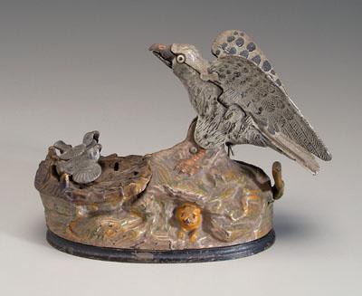 Appraisal: Stevens cast iron mechanical bank eagle and eaglets lever activated