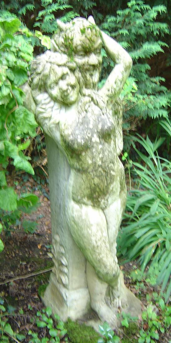 Appraisal: Composition garden statue a wood nymph with a satyr on