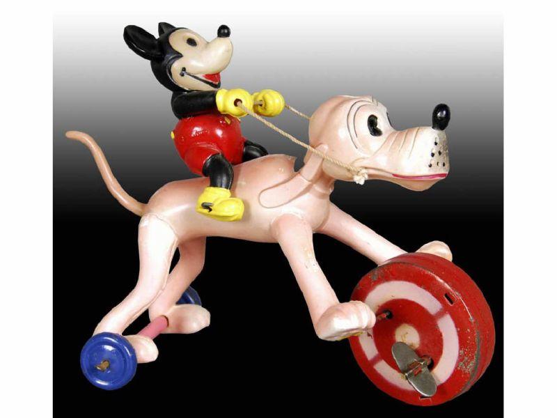 Appraisal: Walt Disney Celluloid Mickey Mouse Riding Pluto To Description ''