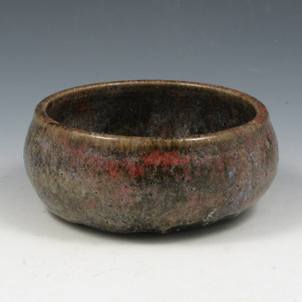 Appraisal: Lea Halpern bowl with red blue brown and olive lava