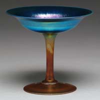 Appraisal: DURAND BLUE COMPOTE Iridescent blue bowl with purple and gold