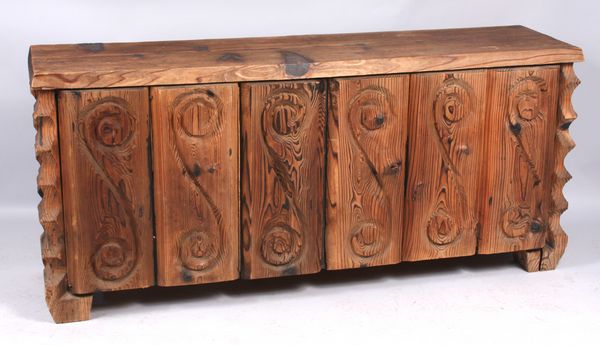 Appraisal: Mid-century rustic carved wood cabinet having a very unusual California