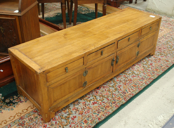 Appraisal: CHINESE YUMU LOW CABINET Ming style having four aligned drawers