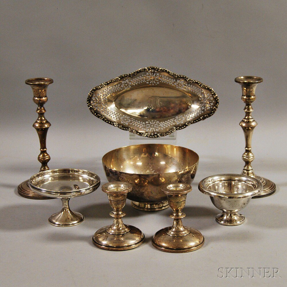 Appraisal: Eight Assorted Silver Items including two pairs of weighted candlesticks