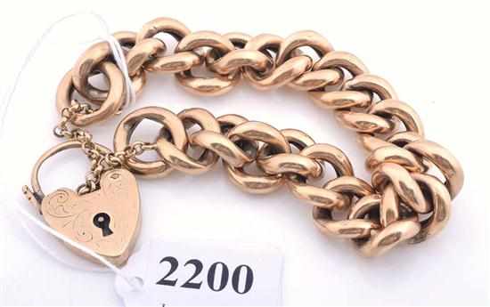 Appraisal: A CURBLINK PADLOCK BRACELET STAMPED CT GOLD