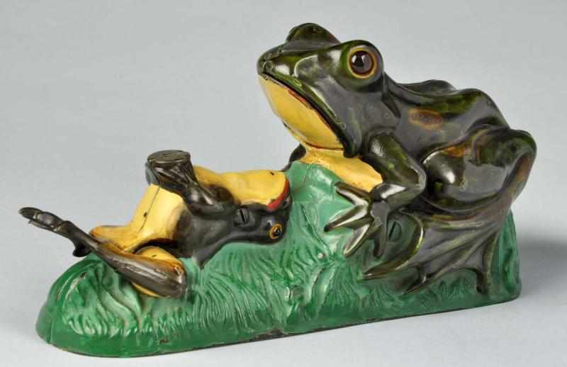 Appraisal: Cast Iron Two Frogs Mechanical Bank Description Working Manufactured by