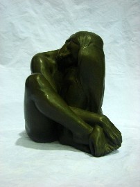 Appraisal: Bronzed figure of a seated nude indistinctly signed with incised