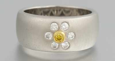 Appraisal: A Heavy Platinum Ring with Yellow and White Diamonds by