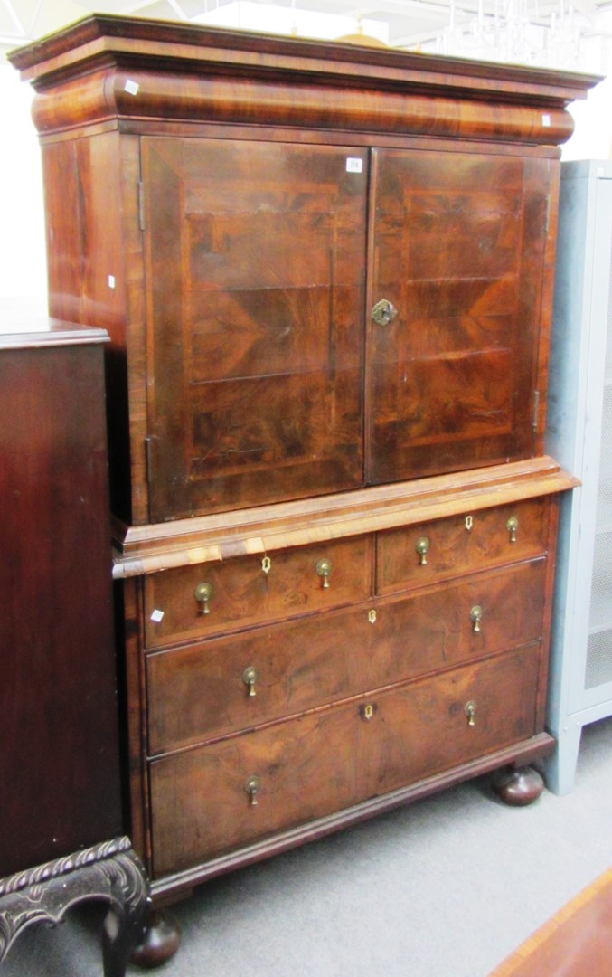 Appraisal: A Queen Anne walnut cabinet on chest the pair of