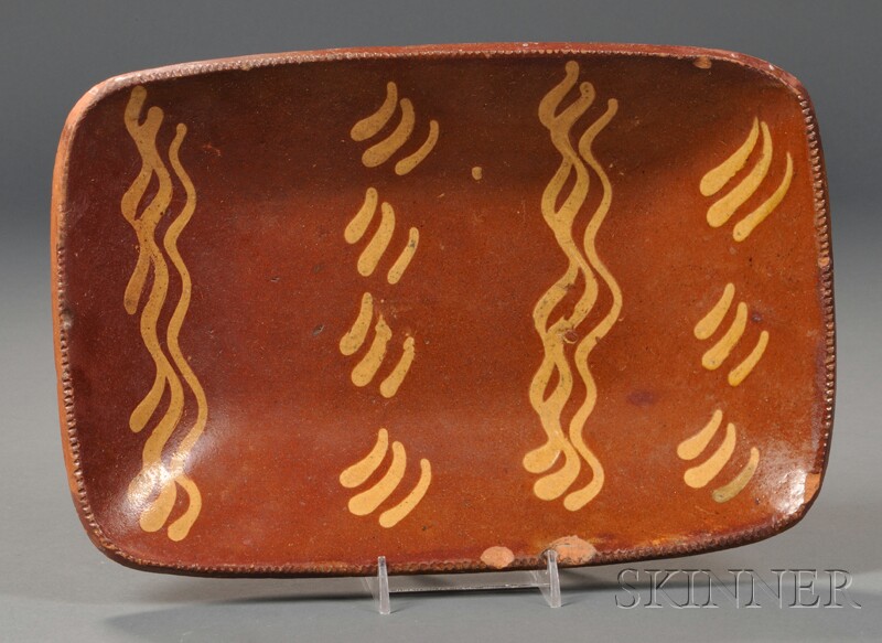 Appraisal: Redware Slip-decorated Loaf Dish America early th century oblong dish