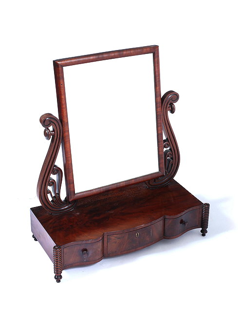 Appraisal: A WILLIAM IV MAHOGANY DRESSING TABLE MIRROR the rectangular cushion