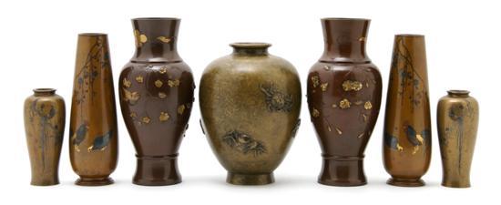 Appraisal: A Collection of Seven Japanese Inlaid Bronze Vases comprised of