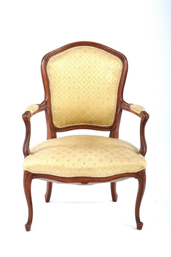 Appraisal: LOUIS XV STYLE CARVED FRUITWOOD FAUTEUIL late th early th