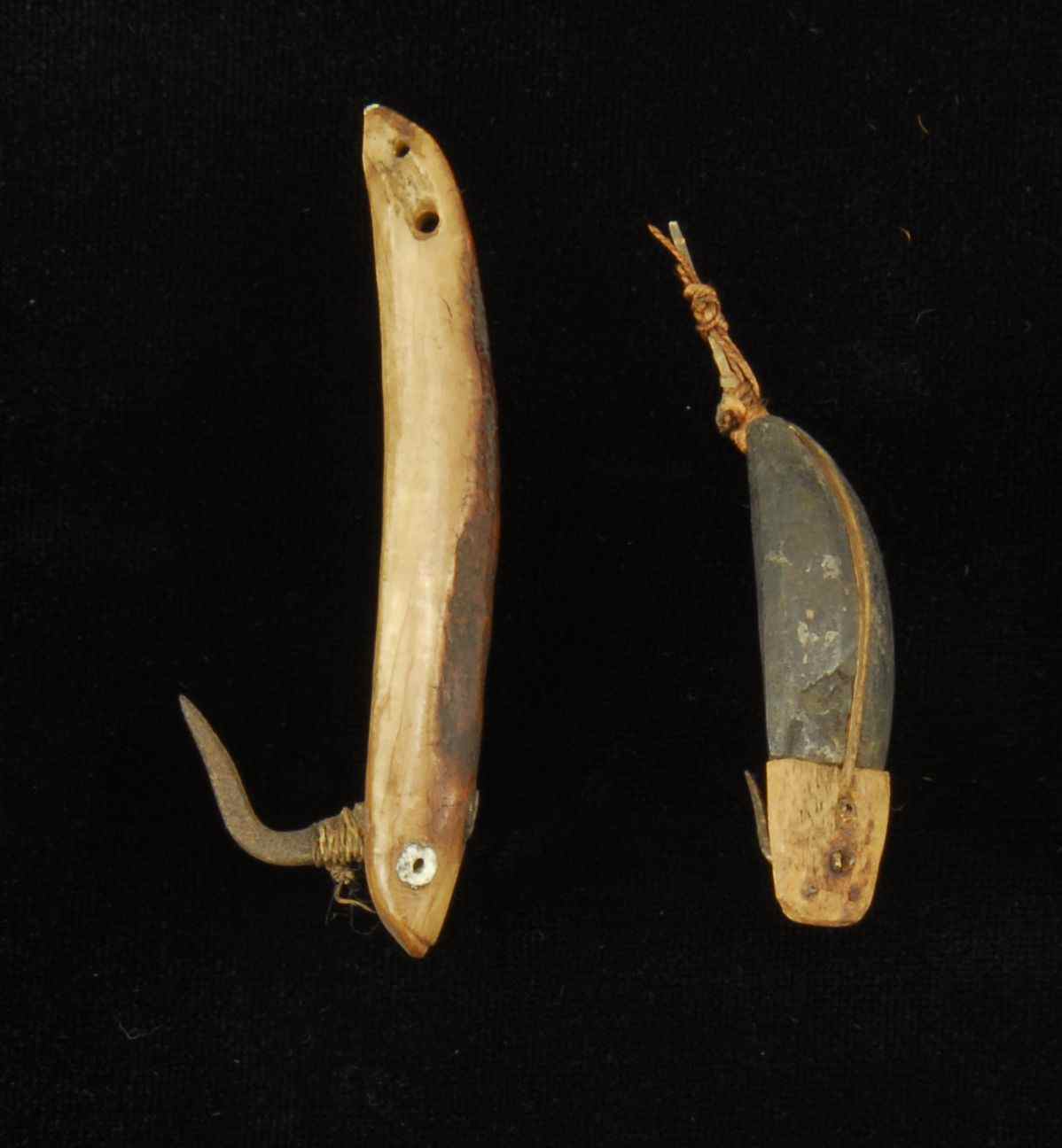 Appraisal: TWO INUIT BONE LURES WITH ORIGINAL HOOKS th CenturyLengths and