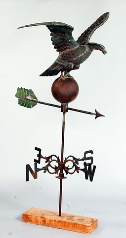 Appraisal: Spread-wing eagle sheathed in verdigris copper perched on brass sphere