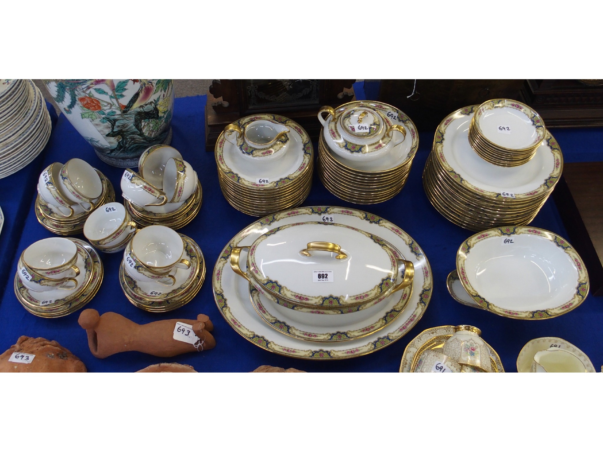 Appraisal: Limoges dinner service comprising plates bowls tureen teaset platters etc