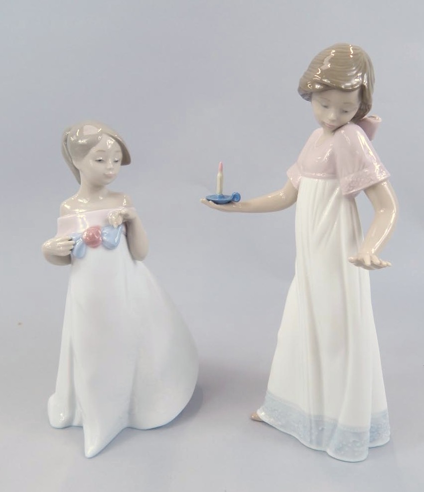 Appraisal: Various Nao figures comprising a girl in flowing robes holding