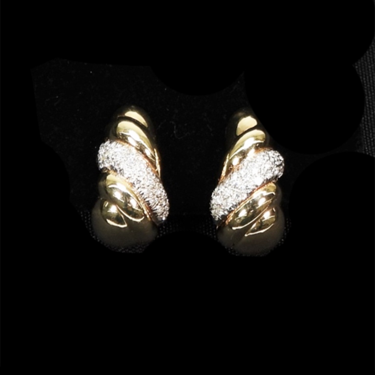 Appraisal: PR K GOLD DIAMOND TWIST EARRINGS Pair of K yellow