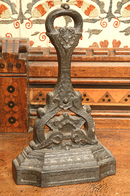 Appraisal: A VICTORIAN CAST IRON DOOR PORTER OR DOOR STOP with