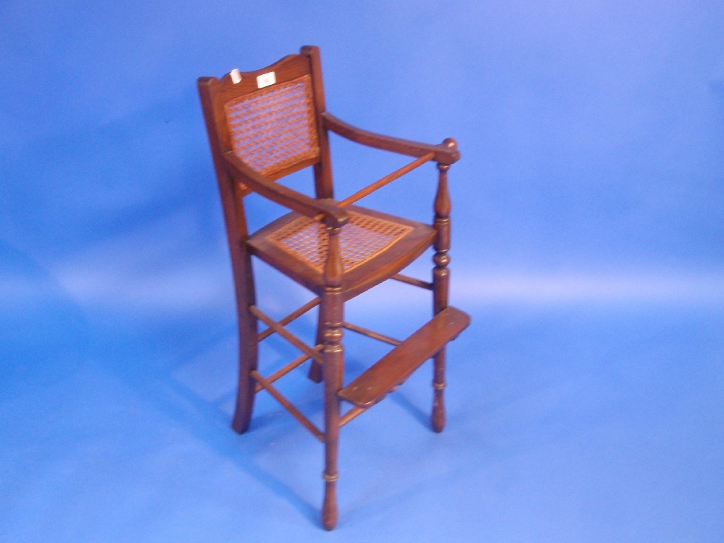 Appraisal: An Edwardian stained beech child's high chair