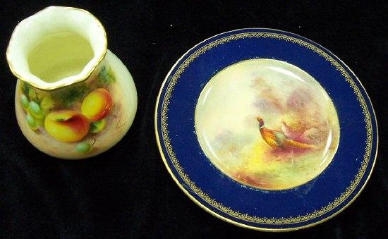 Appraisal: A small Royal Worcester plate decorated pheasants within a blue