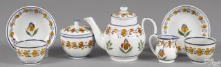 Appraisal: Miniature pearlware tea service th c with floral decoration teapot