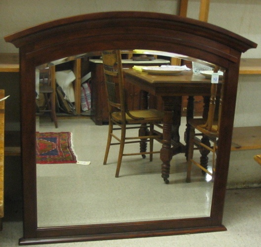 Appraisal: A MAHOGANY FRAMED OVER MANTEL MIRROR the fully beveled glass