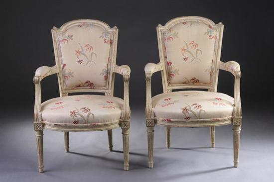 Appraisal: PAIR LOUIS XVI STYLE PAINTED FAUTEUILS mid- th century Each