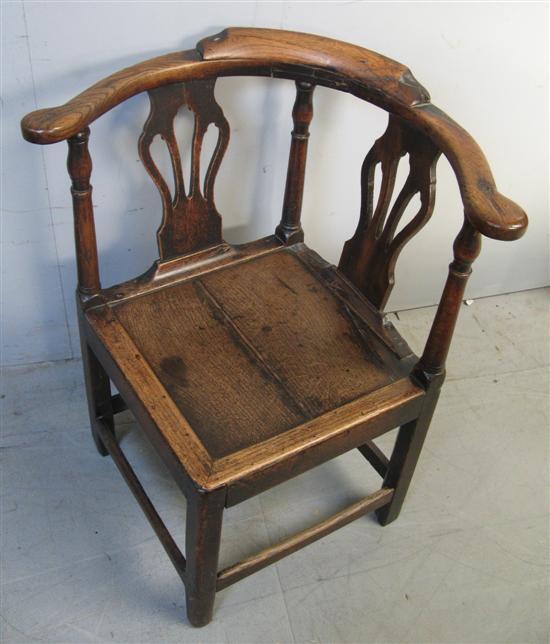 Appraisal: George III oak and elm corner chair with pierced splat