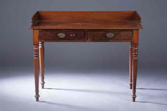 Appraisal: SHERATON MAHOGANY WRITING TABLE early th century Galleried rectangular top