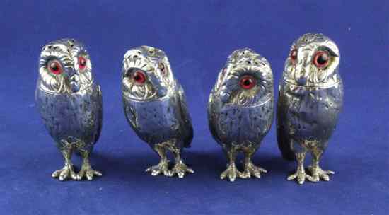 Appraisal: A matched set of four Victorian novelty silver pepperettes modelled