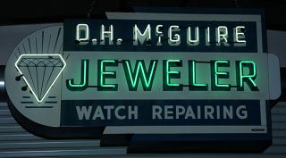 Appraisal: Neon D H McGuire Jeweler porcelain double-sided ' x '