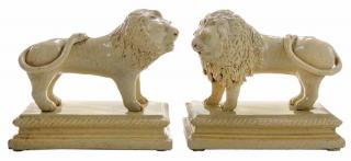 Appraisal: Pair Cream Standing Lions English attributed to Staffordshire late th