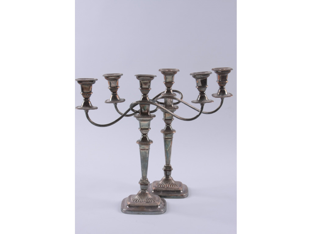 Appraisal: Pair George III Style Sheffield Plate Candelabra three light convert