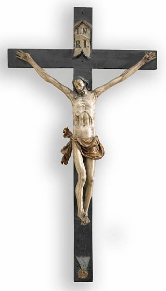 Appraisal: A German carved and polychrome wood crucifix th century The