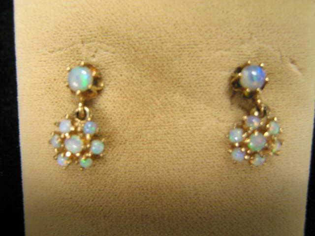 Appraisal: Opal Earrings fiery floral clusters in k yellow gold pierced