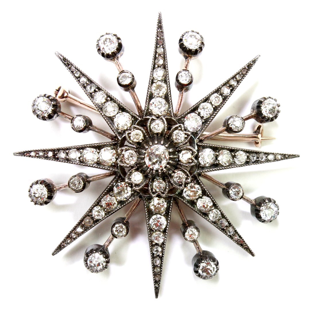 Appraisal: A Victorian diamond set brooch designed as an eight pointed