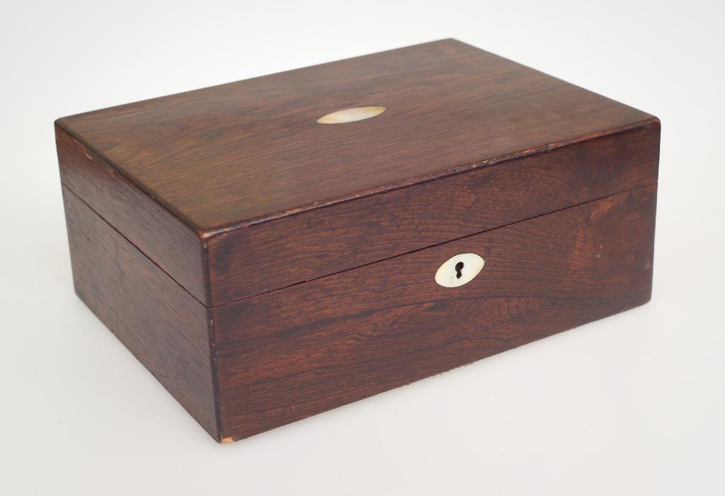 Appraisal: th CENTURY ROSEWOOD JEWELLERY BOX the hinged rectangular lid opening