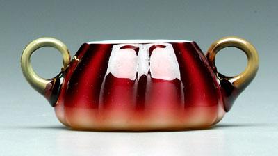 Appraisal: Plated amberina sugar bowl two applied pale amber handles New