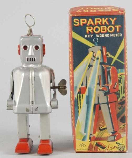 Appraisal: Tin Sparky Robot Wind-Up Toy Description Japanese Made by KO