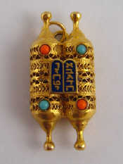 Appraisal: A yellow metal tests carat gold charm with enamel Hebrew