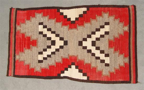 Appraisal: Navajo Rug Typical geometric designs in black white and red