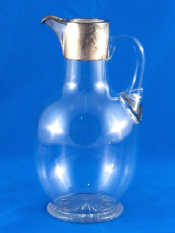 Appraisal: A Victorian silver mounted glass water jug with star cut