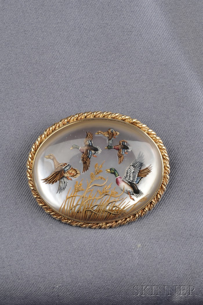 Appraisal: kt Gold and Reverse-painted Crystal Brooch Pendant depicting ducks in