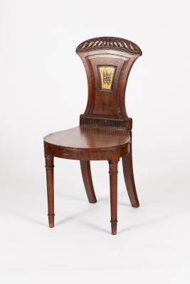 Appraisal: A William IV mahogany hall chair with carved portcullis cresting