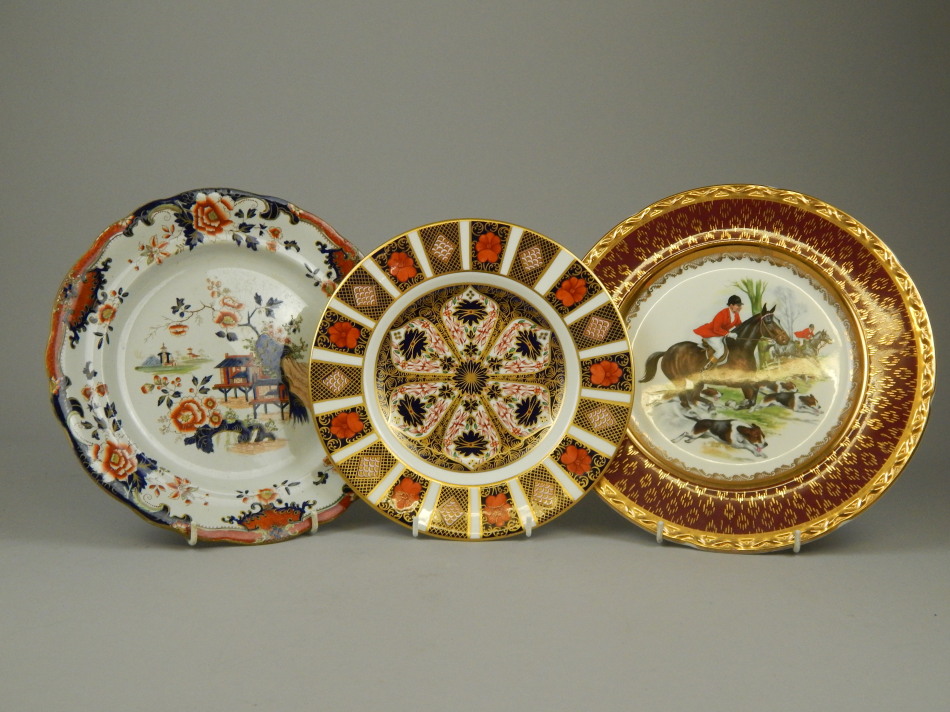 Appraisal: A collection of porcelain plates to include a Royal Crown