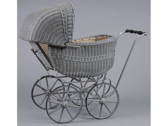 Appraisal: Wicker Baby Carriage America ca rattan body and convertible hood