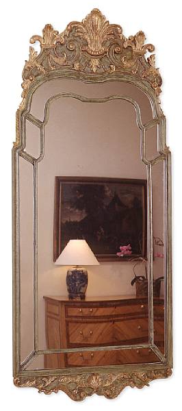 Appraisal: An English Regency style painted and giltwood mirror Boldly carved